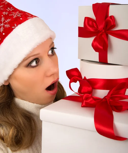 Christmas girl holding many presents — Stock Photo, Image