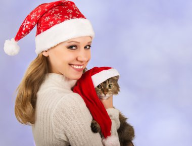 bir kedi ile Noel kız