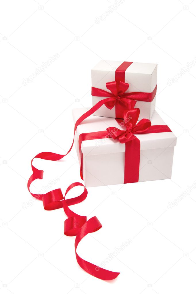 Two white gifts with red ribbons