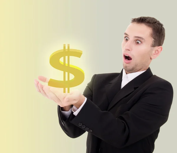 Businessman chooses golden US dollar sign — Stock Photo, Image