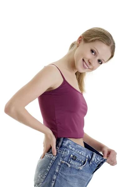 Hezká dívka v džínách zhubl — Stock fotografie