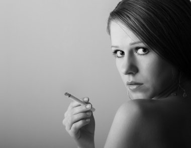 Beautiful girl with a cigarette clipart