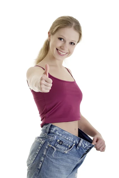 Menina atraente em jeans perdeu peso — Fotografia de Stock