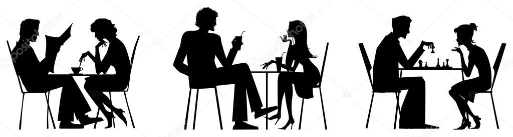 Couple silhouettes near table