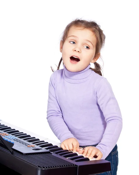 Fata cântând la pian — Fotografie, imagine de stoc