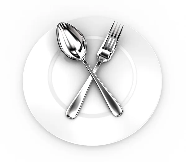 Fork and spoon on a plate — Stock Photo, Image