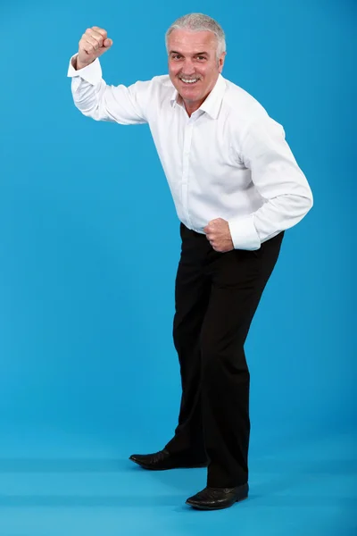 Man i kostym dancing — Stockfoto