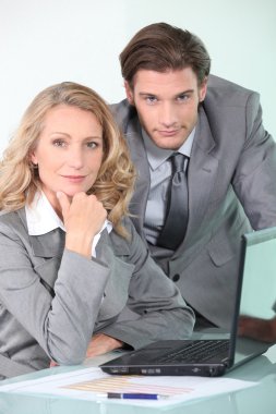 Businessman and woman clipart