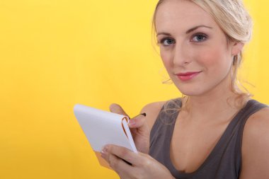 Portrait of a woman with shopping list clipart