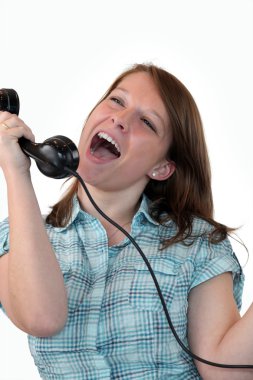 Woman singing down the phone clipart