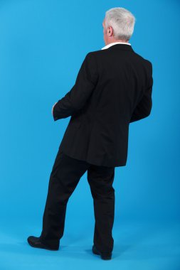 Businessman leaning backwards clipart