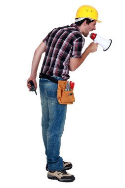 Construction worker shouting into a megaphone clipart