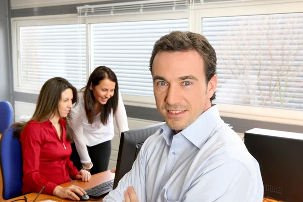 Manager and employees in office — Stock Photo, Image