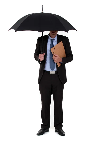 Ein Geschäftsmann mit Regenschirm. — Stockfoto