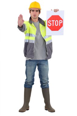 Traffic guard directing traffic clipart