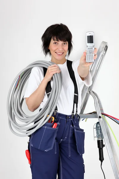 Female plumber isolated on white background — Stock Photo, Image