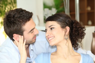 Couple staring lovingly into each other's eyes clipart