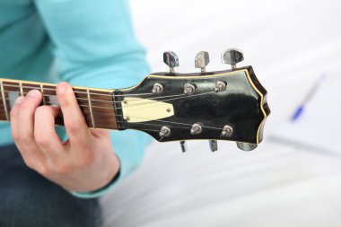 Playing guitar clipart