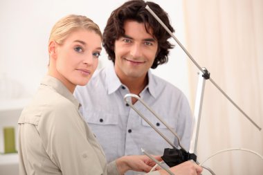 Couple with a television antenna clipart