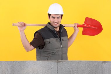 Bricklayer with spade clipart