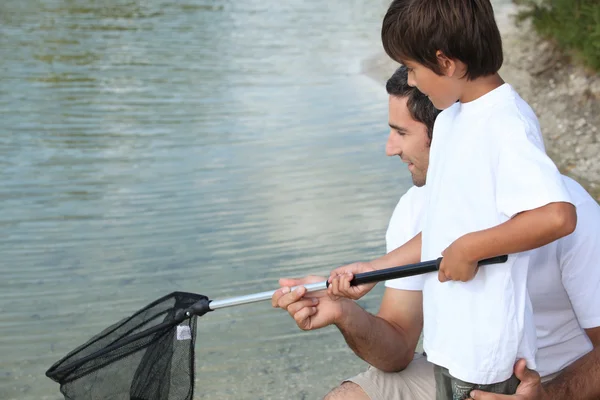 Otec a syn rybaří — Stock fotografie