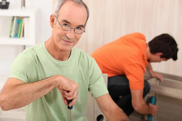 Father and son making furniture — Stock Photo, Image