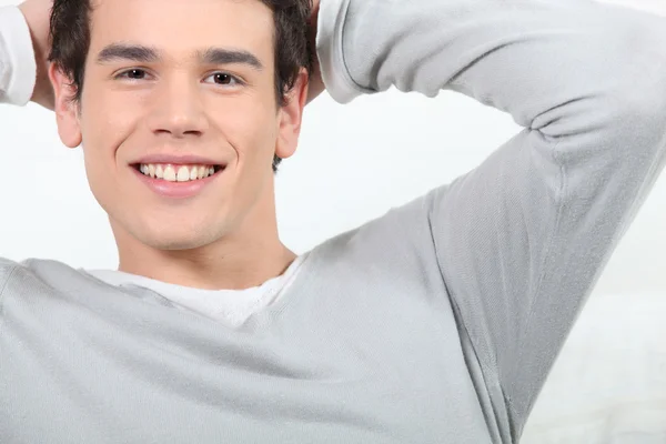 Smiling relaxed young man — Stock Photo, Image