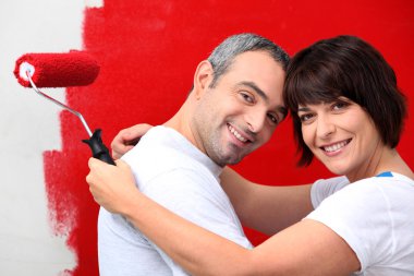 Couple of diy painting it red clipart