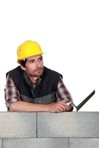 Thoughtful bricklayer — Stock Photo, Image