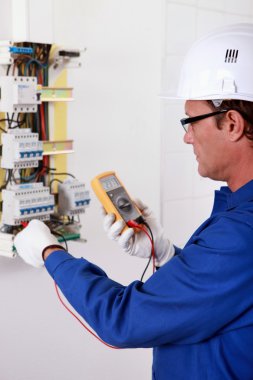 Portrait of an electrician clipart