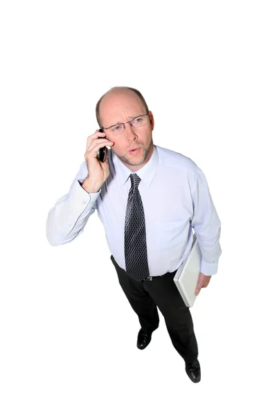 Uomo d'affari calvo al telefono — Foto Stock