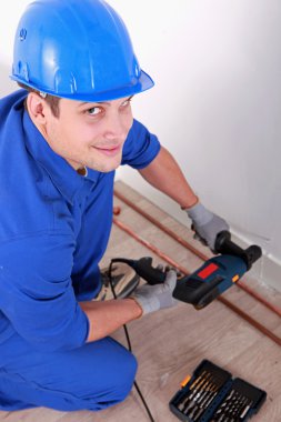 Plumber drilling clipart