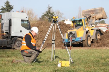 Civil engineer on a construction site clipart