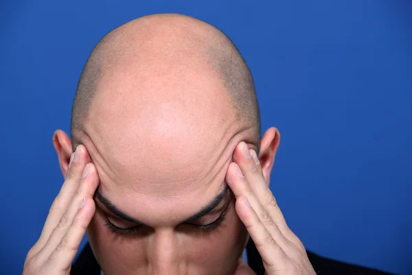 Bald executive under pressure — Stock Photo, Image