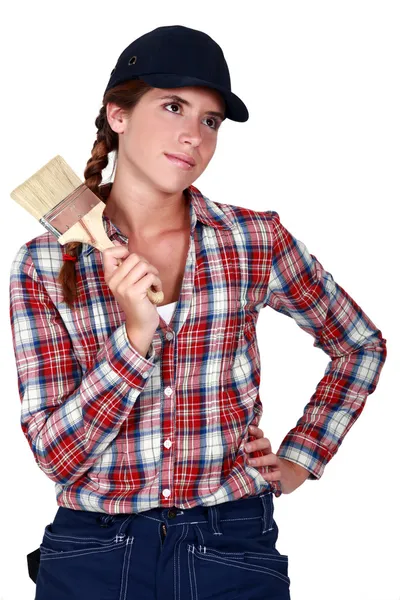 Woman with a paintbrush Stock Photo