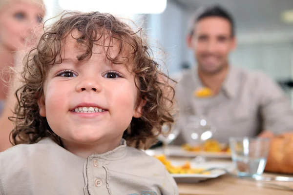 Little kid at kitchen table — Stock Photo, Image