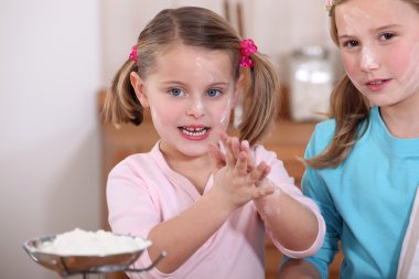 Children baking in the kitchen clipart