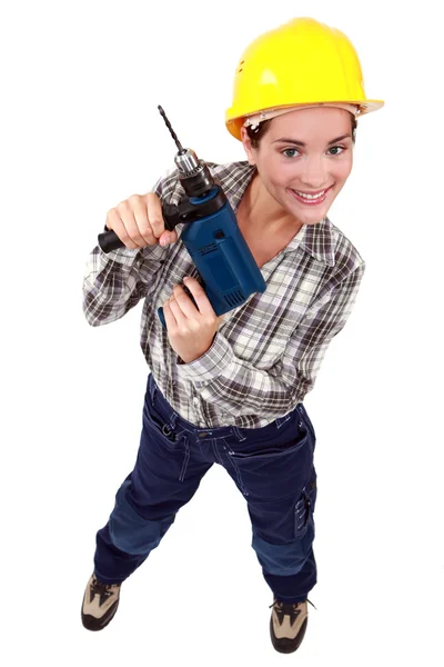 Young woman holding drill — Stock Photo, Image