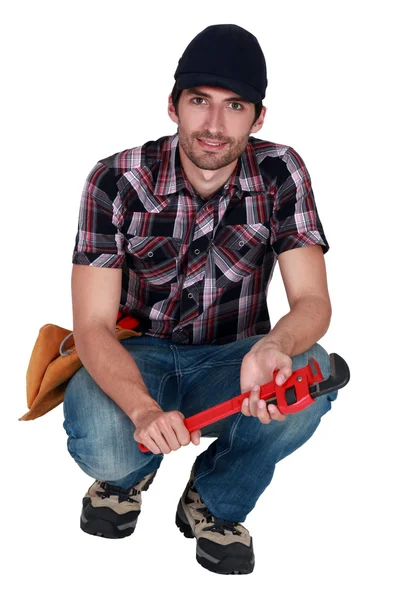 Man holding wrench — Stock Photo, Image