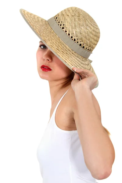 Woman wearing straw hat Royalty Free Stock Images