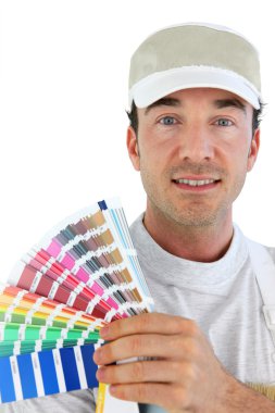 Decorator with a colour chart clipart