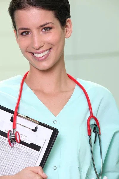 Enfermeira radiante em unidade cirúrgica — Fotografia de Stock