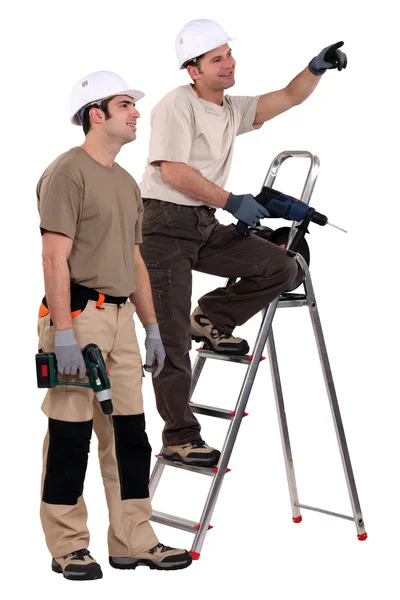 Deux ouvriers avec des exercices bavardant — Photo