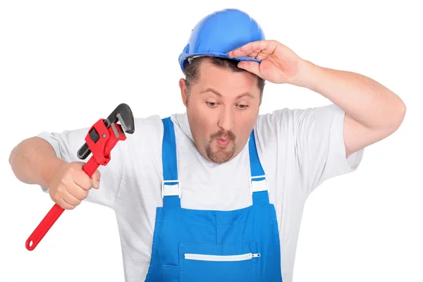 Komedie loodgieter met een moersleutel — Stockfoto