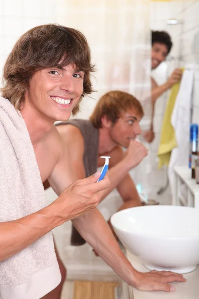 Young men getting ready to go out — Stock Photo, Image