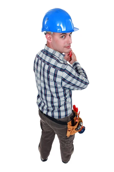 Worker holding screwdriver — Stock Photo, Image