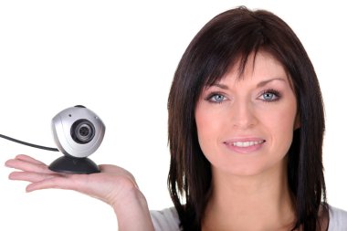 Woman holding web cam clipart