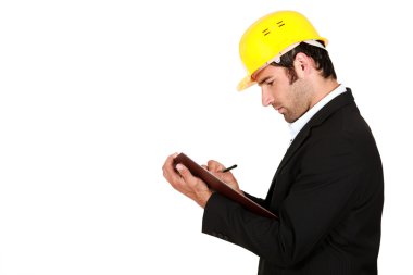 Surveyor writing on a clipboard clipart