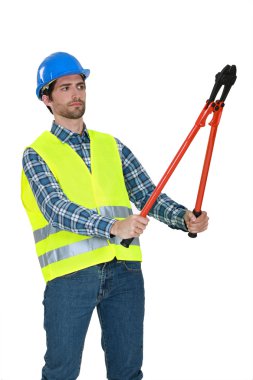 Builder staring at bolt cutters clipart