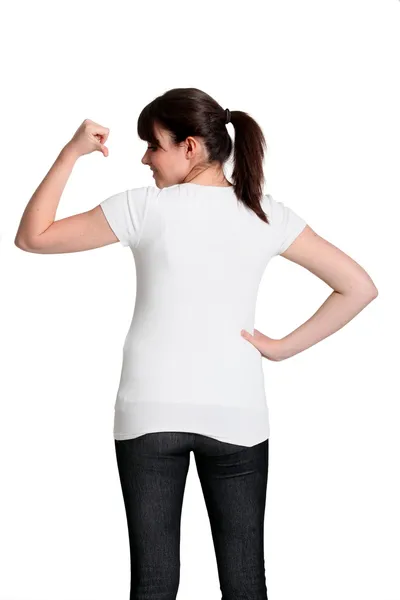 Fiatal lány mutatja neki a póló hátoldalán — Stock Fotó